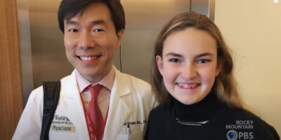 Dr. Urano and one of his patients smiling in PBS documentary on Wolfram Syndrome