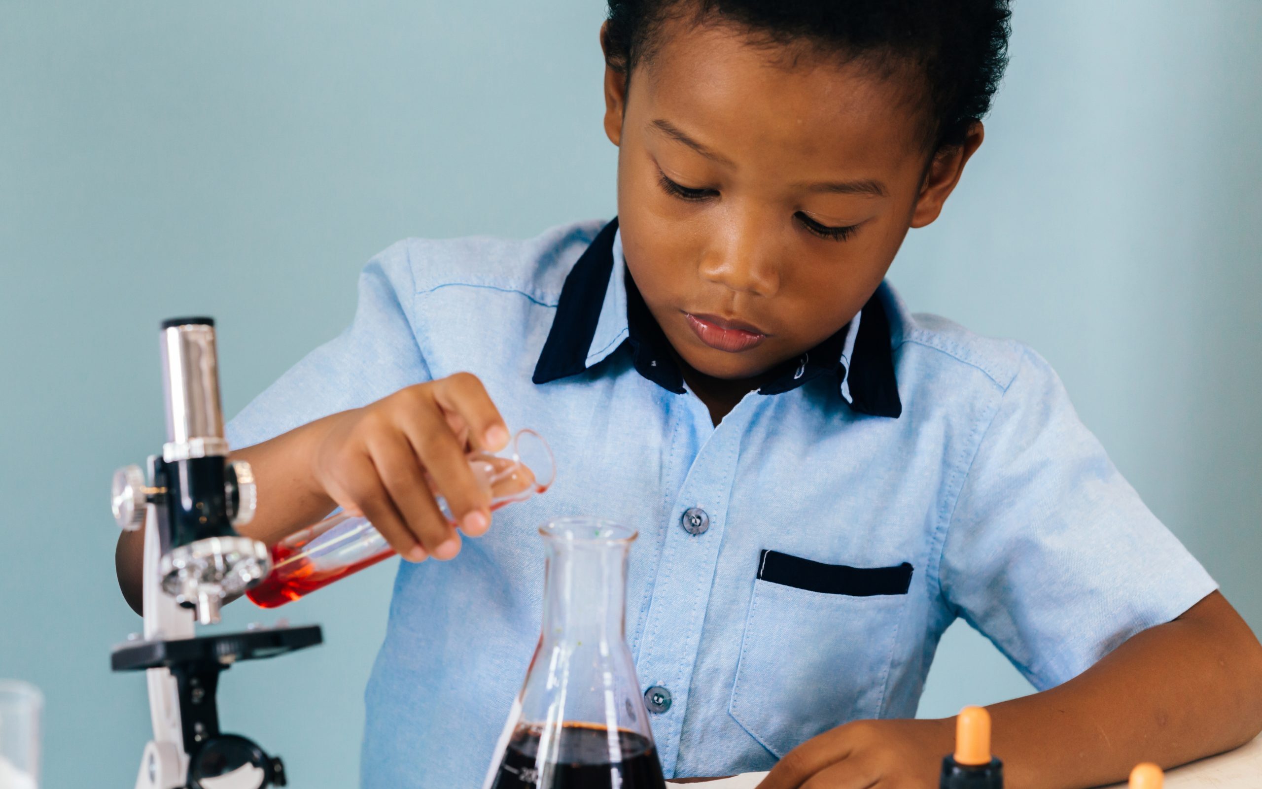 Young scientist experimenting